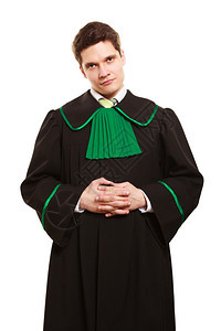 法律庭和司波兰普莱的年轻男律师肖像白边孤立的黑色绿袍职业图片