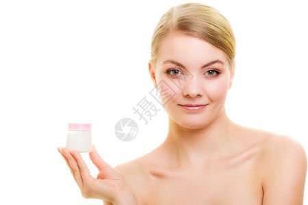 皮肤科年轻女孩照顾干燥的皮肤使用湿润的乳霜隔离美容治疗图片