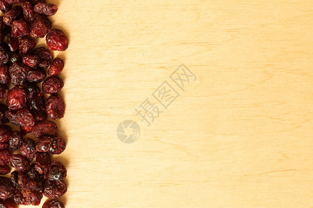 健康食品有机营养健康食品木本底干红莓水果的边界框架图片