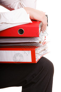 商业和文书工作女商人持有一堆文件夹在办公室工作忙碌的妇女图片