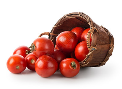 在一个篮子中的番茄孤立在白色背景上图片