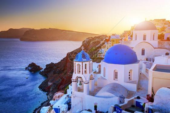 希腊圣托里尼岛的奥亚镇日落时希腊图片