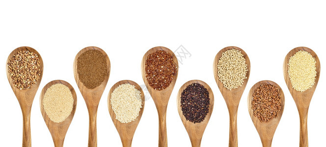 白纸上隔绝的木勺各种无谷质的物buckwheatamaranth褐米小高梁Teff黑红和白quinoa图片