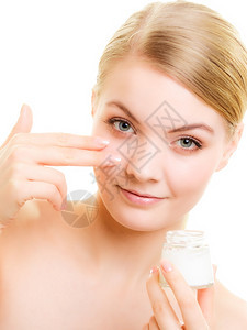 皮肤护理年轻女照顾干皮肤女孩用湿润乳霜隔离美容治疗图片