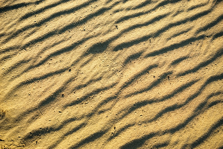 黄沙和波浪的自然背景图片