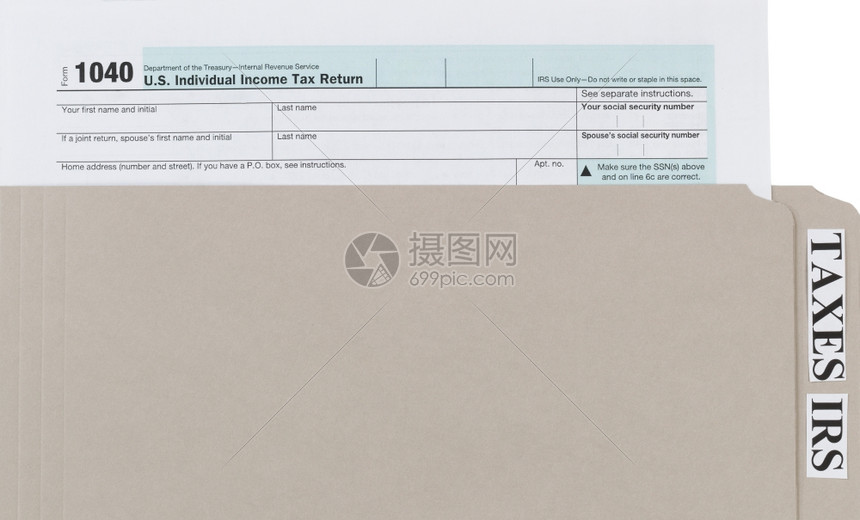 灰色文件夹内的个人所得税表格收的商业金融概念图片