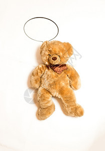 单独拍摄的可爱泰迪熊复制空间语音泡沫躺在地板上图片