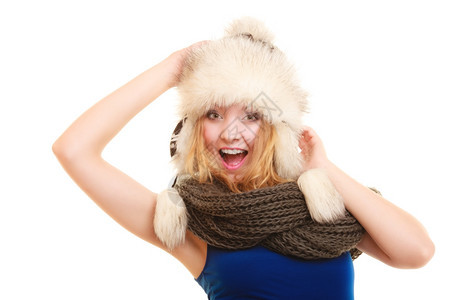 冬季时装穿暖身衣的少女穿着毛帽的年轻女子快乐图片