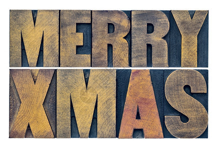 圣诞节Merry圣诞节圣诞节问候或祝愿古老的Grunge纸质木块中的孤立文字图片