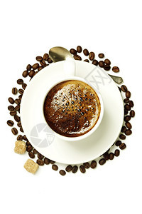 一杯咖啡的顶端视图白色隔开图片