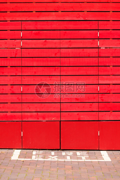 红木板作为背景或纹身消防出口标志红木背景或纹身图片