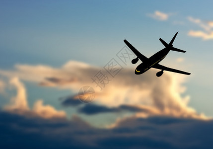 喷气客机在日落的模糊天空中环绕光影矢量说明图片