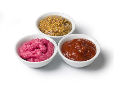 碗端的番茄酱芥末和烧烤背景图片