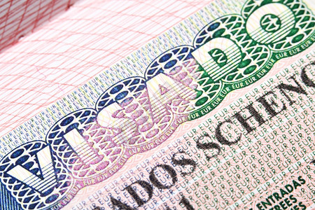 西班牙申根签证在护照中的宏观片安全高清图片素材
