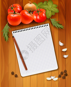 木制背景和笔记本上的新鲜蔬菜和香料图片