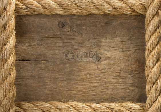 船舶绳索与木材背景纹理接壤图片