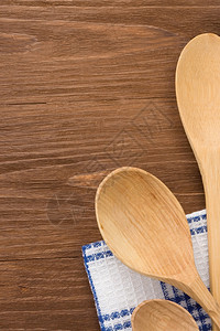 木制背景的勺子作为背景的用具图片