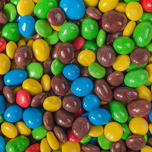 多彩的糖果一堆多彩的巧克力糖果图片