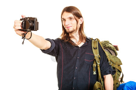 旅行者随身携带照片青年徒步旅行者随身携带李暑假旅孤立于白种背景图片