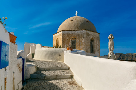 希腊圣托里尼岛Oia或Ia的白色房屋和教堂图片图片