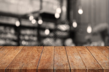 木质桌面西皮亚咖啡店背景模糊股票照片图片