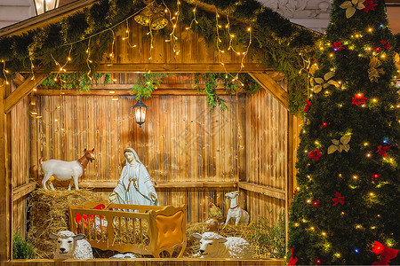 与约瑟夫玛丽圣母利亚基督和绵羊的圣家一起举行诞节庆典在捷克布拉格魔法城市的老举行节日装饰夜晚在捷克布拉格举行图片