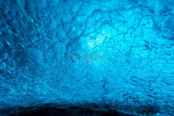 位于VatnajjokullGlacierJokulsarlonNationa公园的冰岛洞穴墙壁背景图片