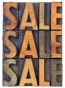 销售单词摘要旧式纸质木头类型中的孤立文本由墨水染色图片