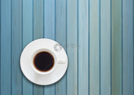 蓝色木本底新鲜咖啡杯顶端视图图片