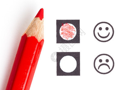 红铅笔选择正确的微笑湿图片