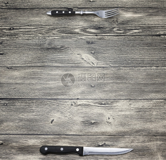 菜单创建餐厅菜单咖啡棒带叉子和刀的木制桌良好背景可用于餐饮或酒吧菜单列表图片