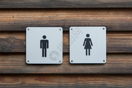 男人和女士马桶标志木头金属图片