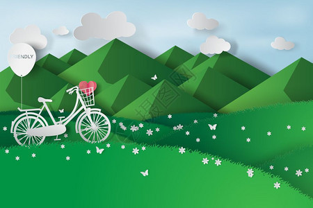折纸风格绿色背景田野自行车图片