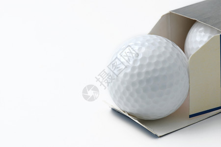 从盒子中打开新的高尔夫球背景图片