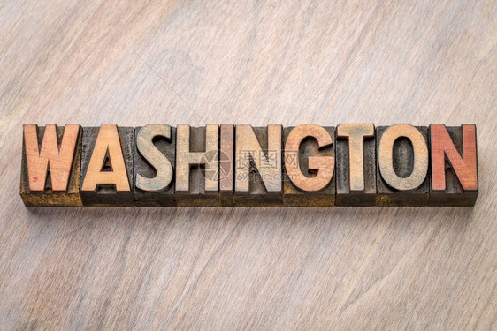 华盛顿用旧式纸质印刷木材类型的字词抽象与谷状木背景对比图片