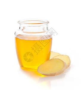 在白色背景上隔离的蜂蜜和姜汁罐图片