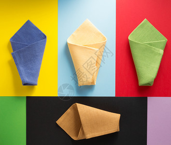 多彩 的布抽象多彩背景的折叠餐巾纸背景