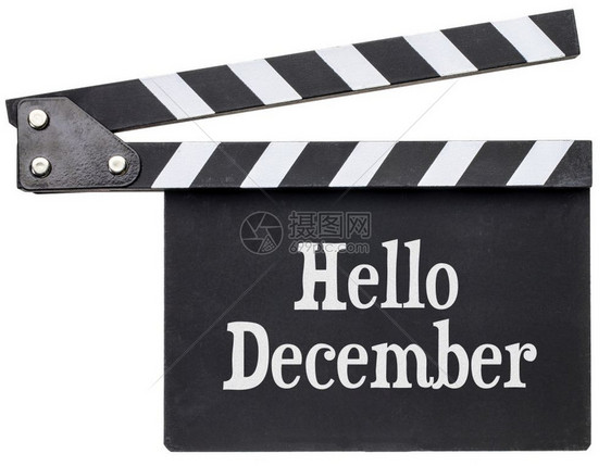 你好12月电影标题白粉钟板上的纸笔孤立在板上图片