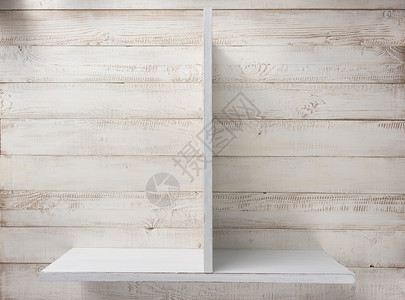 白色墙壁背景纹理的木板架图片