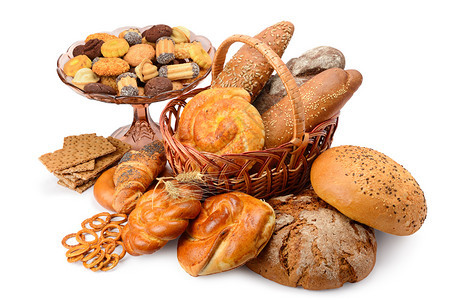 在白色背景中隔绝的多种面包产品篮子面包饼干图片
