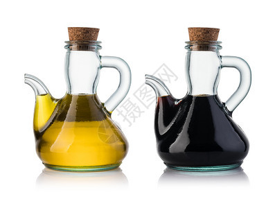 白底绝缘的橄榄油和黄麻醋图片