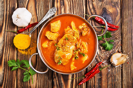 传统印度菜鸡碗里辣咖哩背景图片