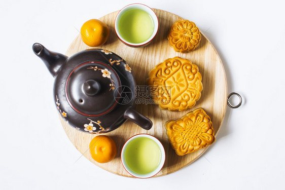 秋节的月饼和茶叶白隔绝复制空间图片