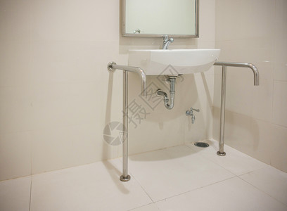 具有复制空间的残疾厕所盆地背景图片