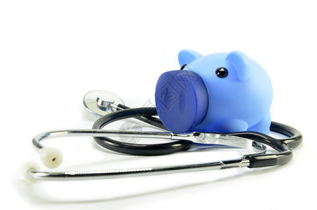 显示医疗或金融概念的立体镜和猪库图片