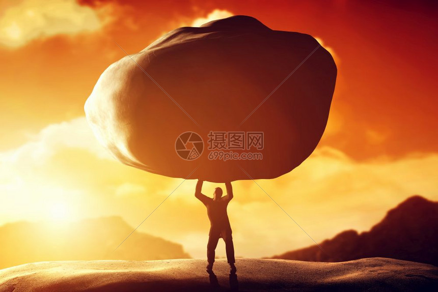 人举起巨大的岩石符号力量的概念负担压载物动力等