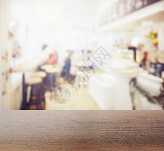 木制桌顶内装咖啡店模糊作为背景图片