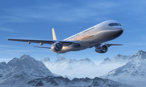 一架客机在雪山上空飞行图片