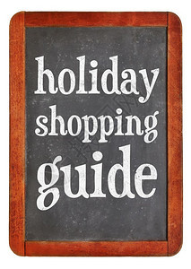 假日购物指南古董板黑上的白粉文字黑板背景图片