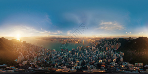 以360个全景以180度角个全景无缝日落时香港市下城的全景Skybox用作VR内容的直角方形球等距离预测背景图片